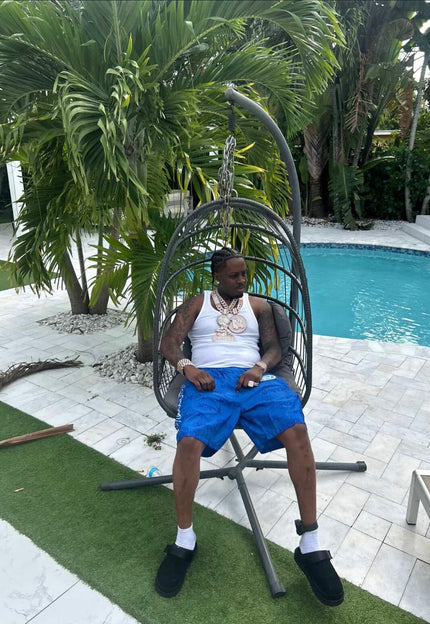 <strong>@Real Boston Richey</strong> | Rocking our Storm Script Windbreaker Shorts by the pool.